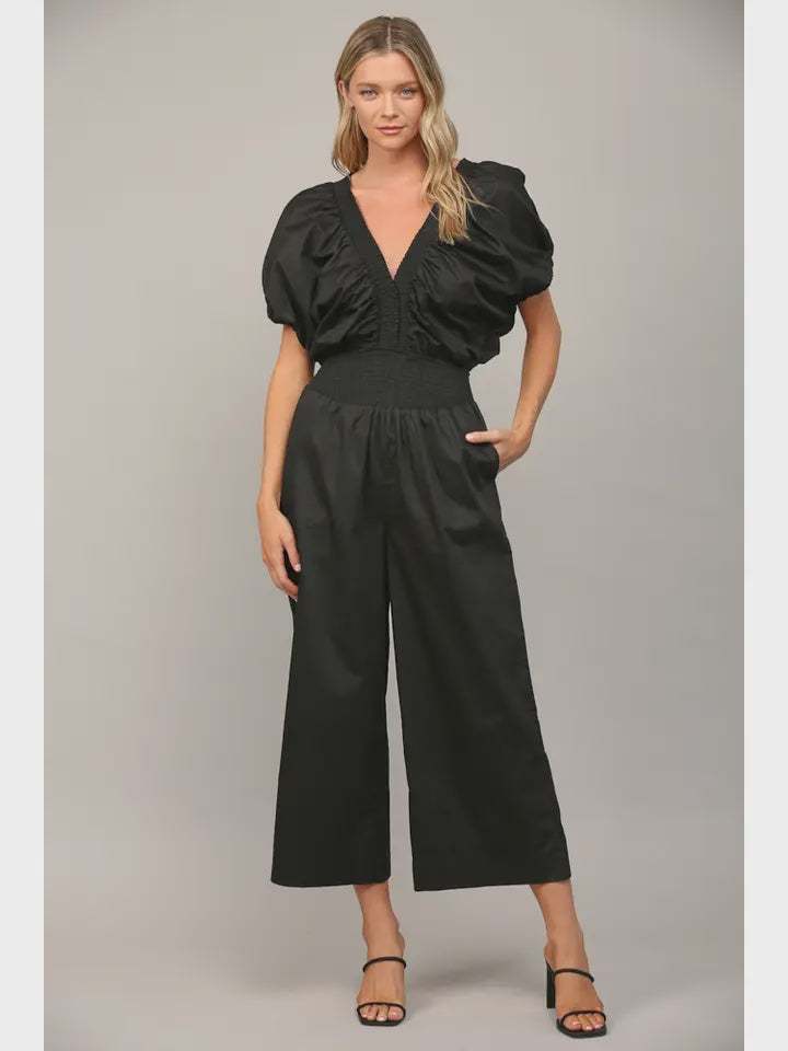Open Tie Back Jumpsuit with an alluring open back and adjustable tie, stylish and versatile design.
