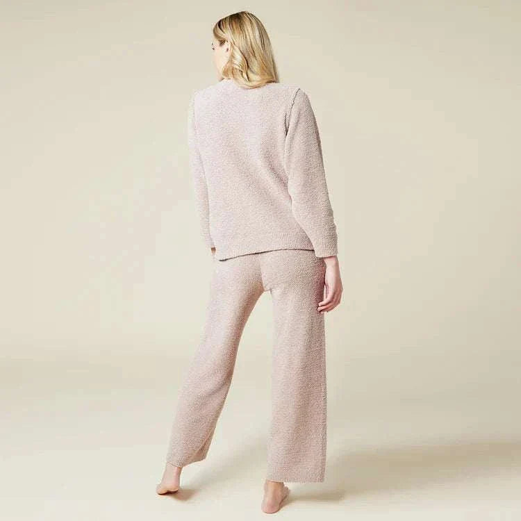 Woman wearing Solid Marshmallow Reverse Seam Crew Neck Lounge Set showcasing cozy fabric and modern design.