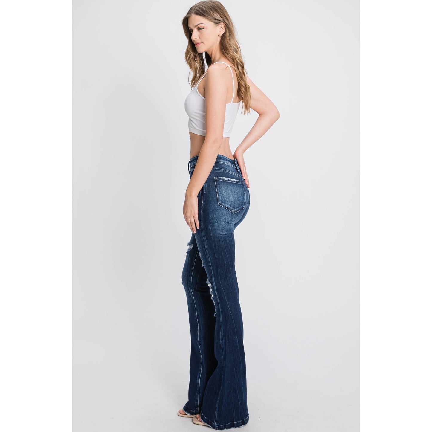 Tara Mid Rise Distressed Flare Slimming Jean