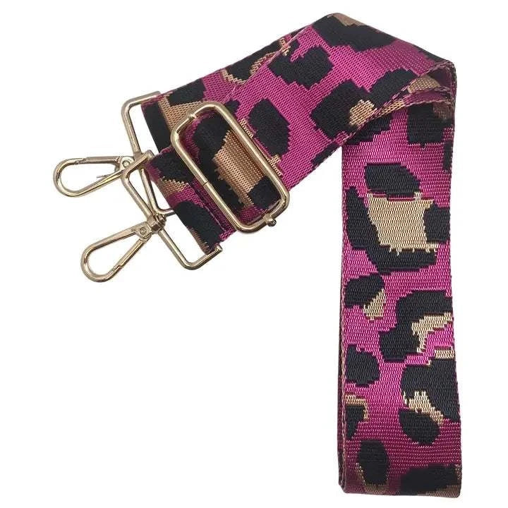 Leopard strap with bold animal-print pattern and adjustable metal clips.