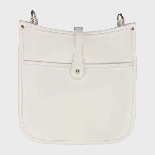 Corbyn Vegan Messenger bag in white with gold hardware and front pocket.