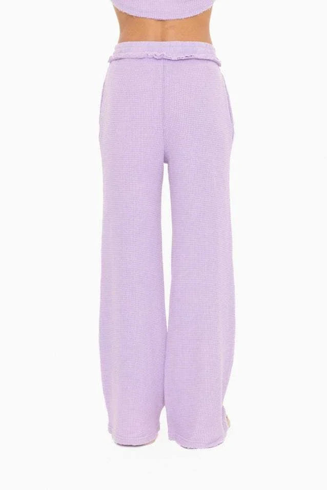 Monica Pants in purple waffle knit with adjustable drawcord and side pockets.